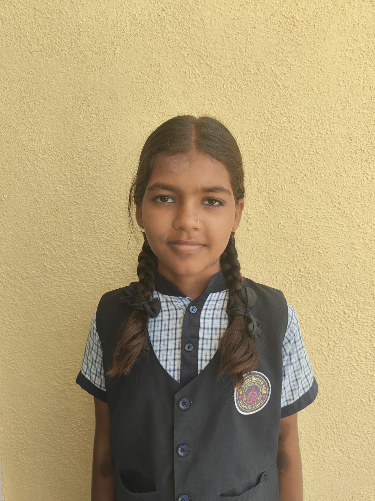 RIYA LAXMAN DHEMBARE